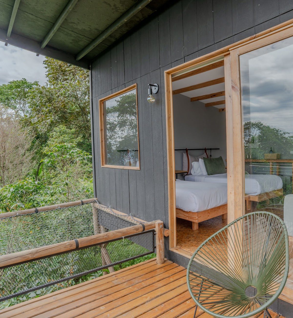 The shared room's private deck, with the beds visible inside